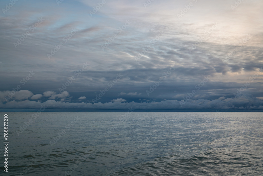 Fototapeta premium View of the Black Sea on the coast of Sochi against the sunset sky, Sochi, Krasnodar Krai, Russia
