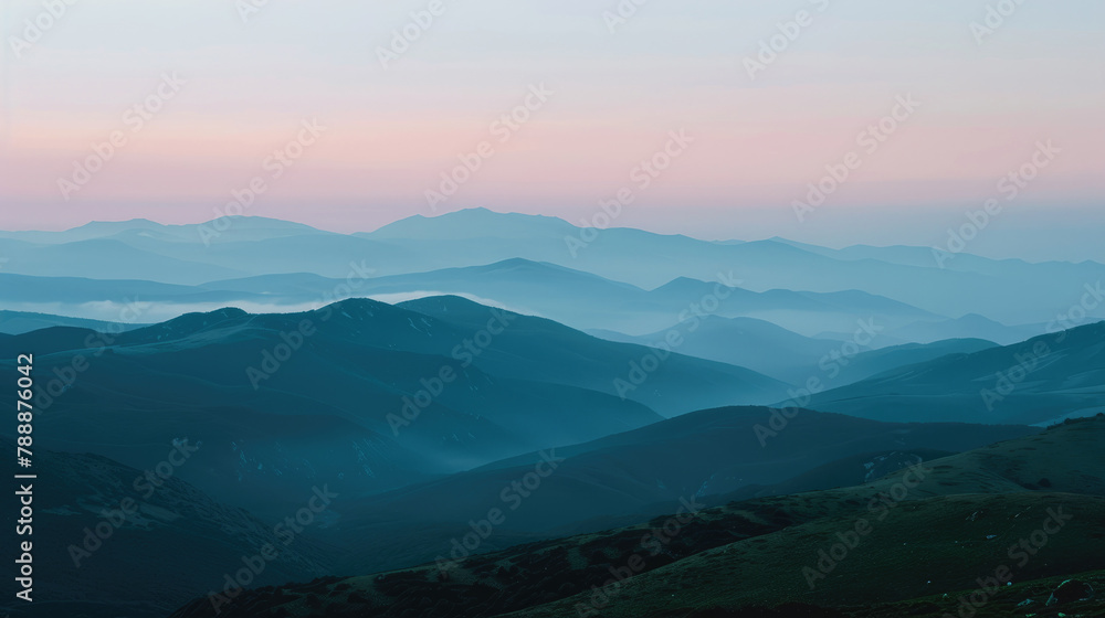 Serene twilight over gentle mountains for soothing landscape imagery