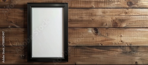 Highlighted by the texture of the wooden wall, this close-up showcases a picture frame in crisp detail