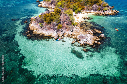 Aerial view of island and clear water