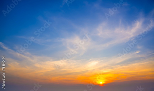 Colorful cirrus cloudy sky at sunset. Gradient warm cold color. Sky texture  abstract nature background