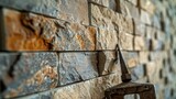 The bricklayer leaned his tools against the wall once he finished installing the granite tiles