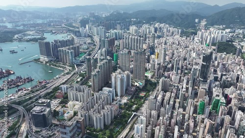 Hong Kong Kowloon Mei Foo Lai Chi Kok Sham Shui Po Cheung Sha Wan Nam Cheong, a mixture of old and new multi-story buildings with crowded old densely residential commercial downtown,Drone Aerial  photo