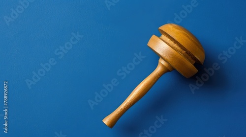 A high quality photo of a dreidel or dreydl on a striking blue background is available photo