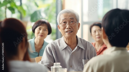 Group of Asian seniors, elderly and lonely people in community center Circle group therapy in a nursing home