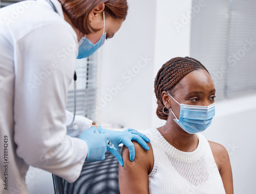 African patient, nurse and vaccine in syringe for medical healthcare or covid safety. Woman, mask and hospital for injection, sick or wellness for flu or corona virus with health expert in pandemic