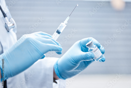 Doctor, covid 19 and vaccine for injection or dose at clinic for protection of spread from pandemic virus or disease. Nurse, needle and booster shot in hospital from medic expert with cure for health