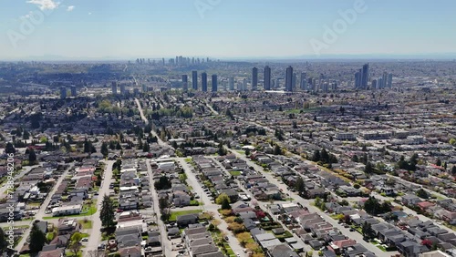 Panoramic aerial drone view of the skyline of Burnaby during a spring season in British Columbia, Canada