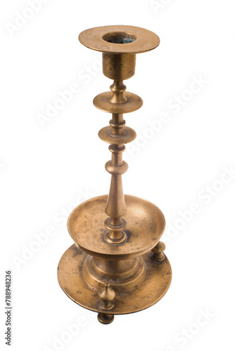 Antique metal candelabra for candles on a white background