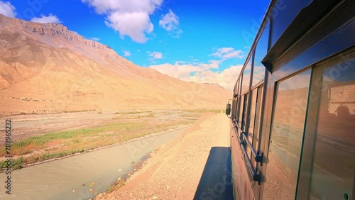 POV Bus ride , View of Spiti valley in Himacal pradesh, passing trough high altitude of Himalayan mountains in the government busses photo