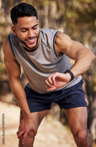 Watch, time and man or runner outdoor for morning cardio, exercise and training for marathon or race. Male athlete, smart watch or stopwatch to track progress for workout or wellness and check clock.
