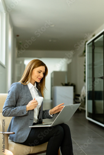 Elegant businesswoman enjoy...