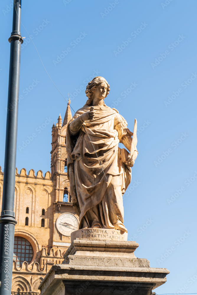 Palermo, Sicily, Italy. Statue of Saint Nymph in the garden of the Cathedral Palermo. Sunny summer day