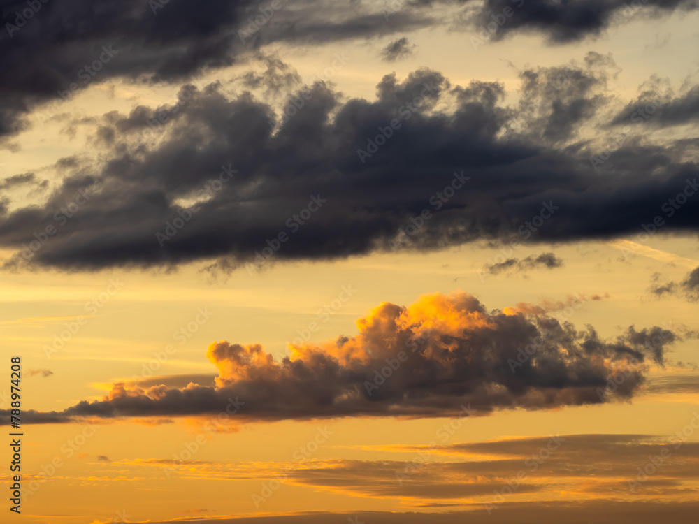 Fototapeta premium Fire dusk dramatic burning sky clouds twilight evening gold orange sunset
