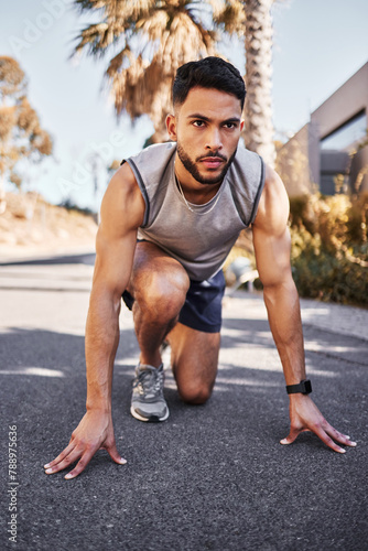 Sport, runner and man for fitness in outdoors for exercise, training and workout for health. Active, male person and athlete with marathon race on track for muscles, wellness and cardio in street