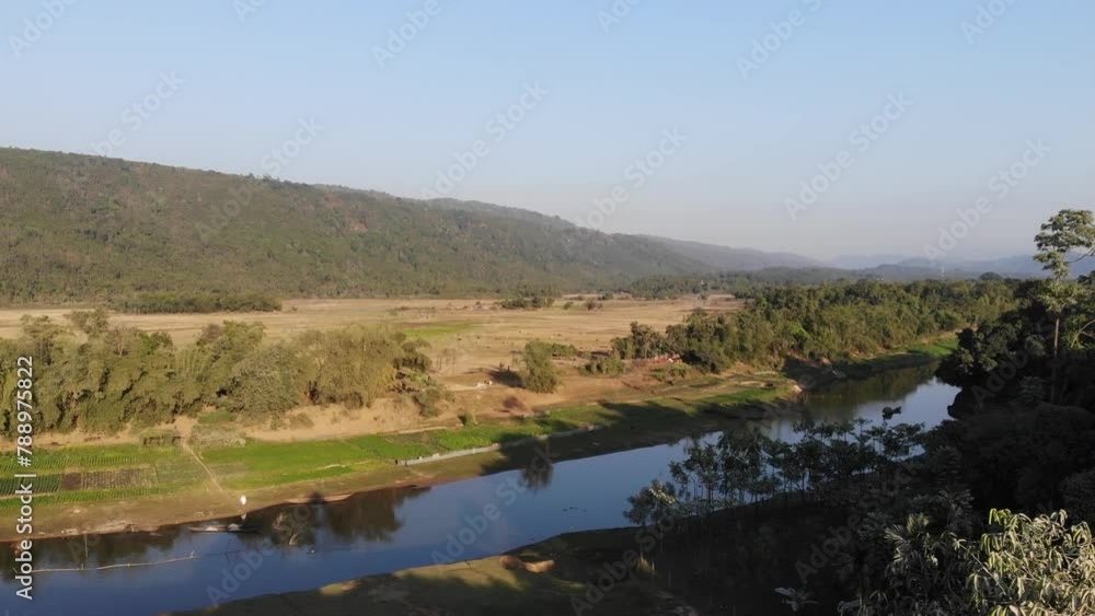 Aerial video drone shots of the Bangladesh landscape with lush green foliage, trees and the river Aerial video drone shots of the Bangladesh landscape with lush green foliage, trees and the river