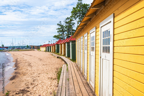 Beach cabins at a sandy beach