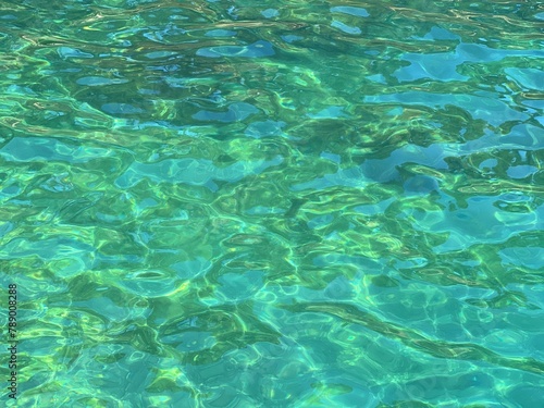 Amazing clear sea water emerald blue surface 