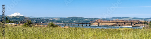 Panorama of the Dalles Bridge across the Columbia River with Mount Hood in the background at The Dalles, Oregon, USA photo