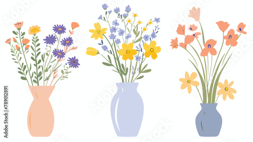 Spring flowers in vase. Gentle field floral plants