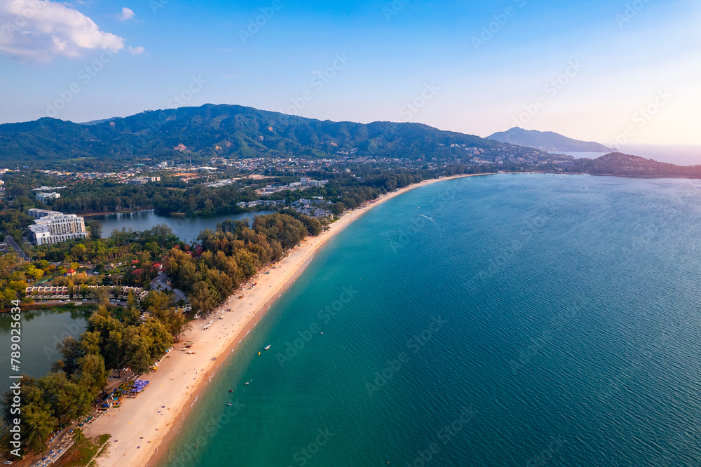 Sunset Bang Tao beach with lux hotel of Phuket paradise, Aerial top view. Concept tropical travel photo Thailand