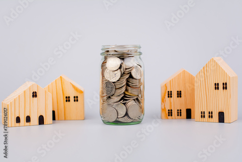 Money and home savings coins create assets to invest in the stock market and mutual funds. Cash flow and financial credit