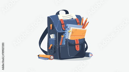 Schoolbag full of school stationery books and supplie photo