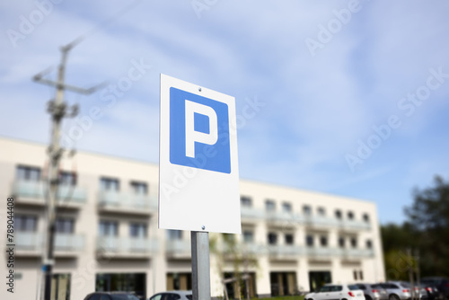 Parking Sign in Front of Building