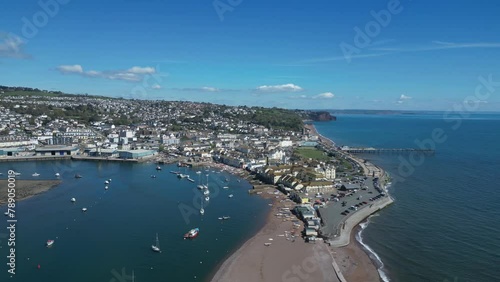 Teignmouth, South Devon, England: DRONE VIEWS: The drone circles Teignmouth and the River Teign estuary showing the pier and river bridge. Teignmouth is a popular UK holiday destination (Clip 7). photo