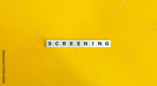 Screening Word. Text on Block Letter Tiles on Yellow Background. Minimalist Aesthetics.