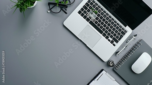 Overhead shot of laptop and business accessories on gray background Office desktop  Flat lay : Generative AI photo