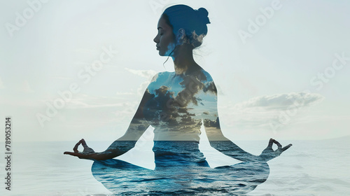 Double exposure of woman meditating in lotus pose and sea landscape.