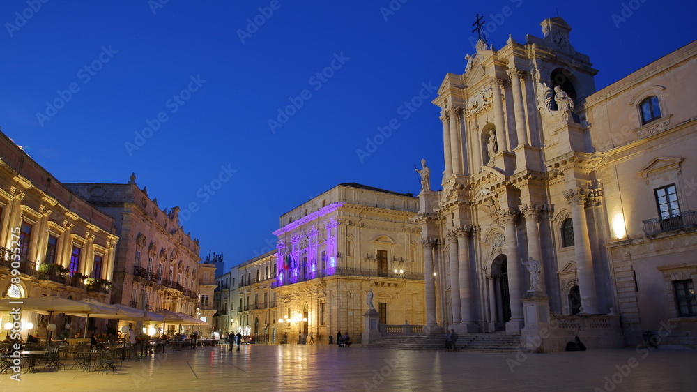 Piazza del Duomo (Duomo Square), with the Duomo Cathedral, Ortigia Island, Syracuse, Sicily, Italy. Picture taken in the evening at blue hour