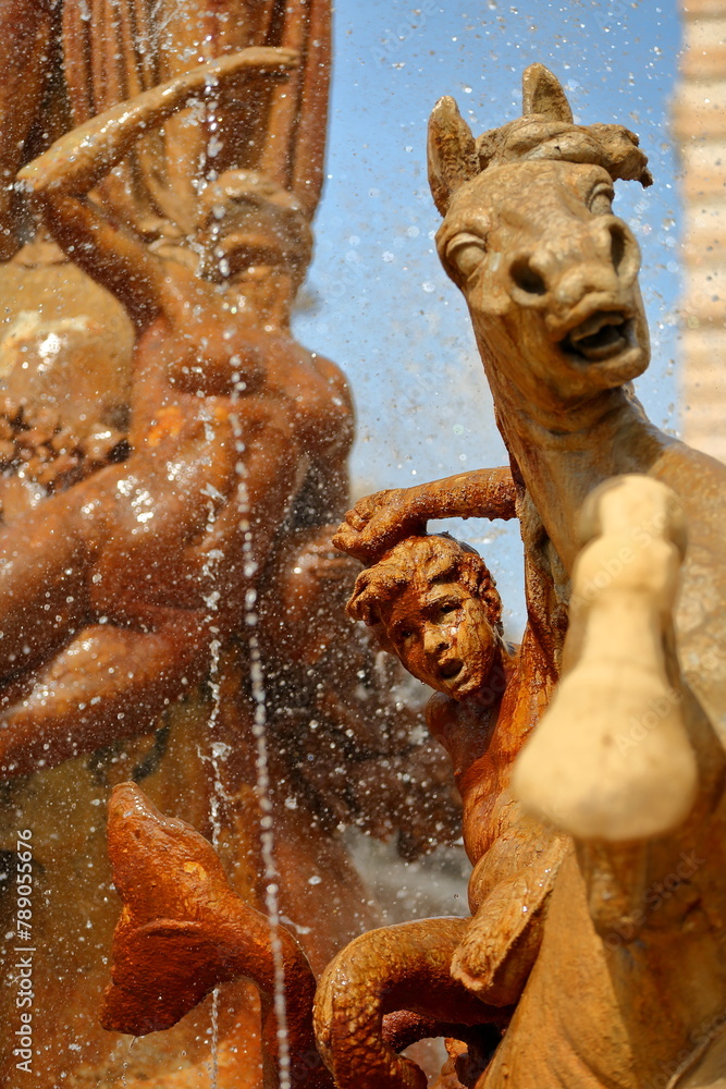 Close-up on details of Artemis fountain (or Diana fountain, dated from 1906) located on Piazza Archimede (Archimede square) in Ortigia Island, Syracuse, Sicily, Italy