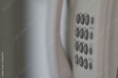 Classic telephone buttons on blurred background © Robert A. Witkowski