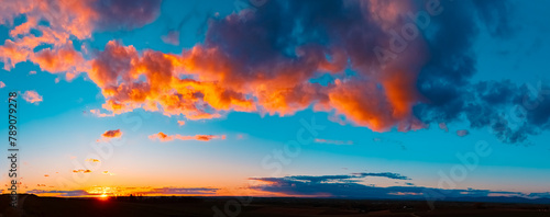 High resolution stitched spring sunset panorama with dramatic clouds near Ettling, Isar, Wallersdorf, Dingolfing-Landau, Bavaria, Germany photo