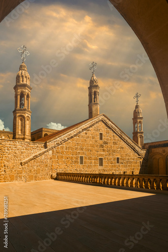 Mardin Midyat district Mor Gabriel Monastery unique architectural detail photographs taken with blue sky photo