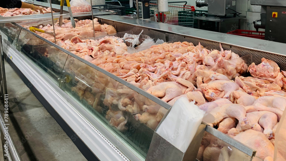 A display of chicken meat in a store