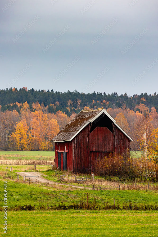 old red barn in autumn old red barn in autumn