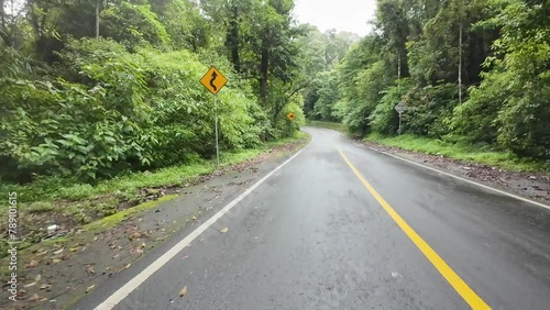 This is a road in the middle of the forest on the slopes of Mount Rinjani - Lombok Indonesia.