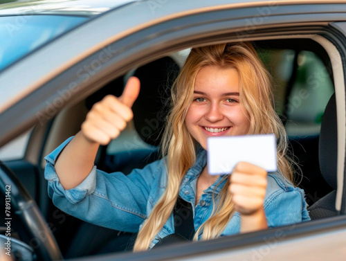 Wallpaper Mural Young Woman Shows Her Drivers License With a Thumbs Up From Car Torontodigital.ca