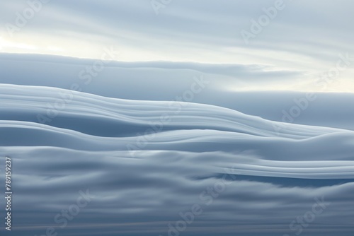 Tranquil scene of minimalist cloud patterns resembling gentle waves in the sky