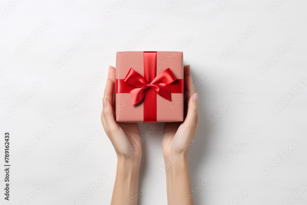 Hands extend a gift from right to left, top view, light background, realistic photo image сreated with Generative Ai Hands extend a gift from right to left, top view, light background, realistic photo image сreated with Generative Ai