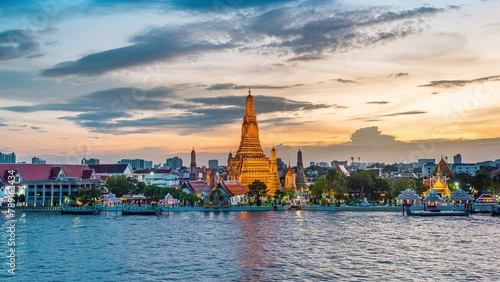 Wat Arun Ratchawararam at sunset(Temple of Dawn) famous tourist destination in Bangkok, Thailand. photo