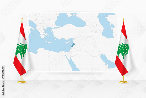Map of Lebanon and flags of Lebanon on flag stand.