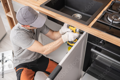 Εκτύπωση καμβά Cabinetmaker Assembling Kitchen Cabinets Furniture