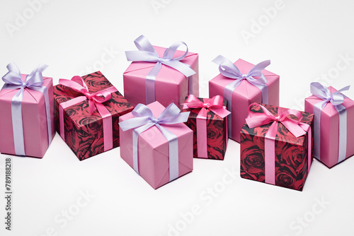  Lot of holiday boxes. Gift in box. Multicolored ribbons. Boxes in row. Celebration. Happy Holidays. Copy space.