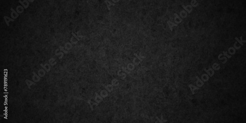 Dark black wall grunge textured concrete backdrop background. Panorama dark grey black slate gradient background or texture. Vector black concrete texture. Stone wall background. photo