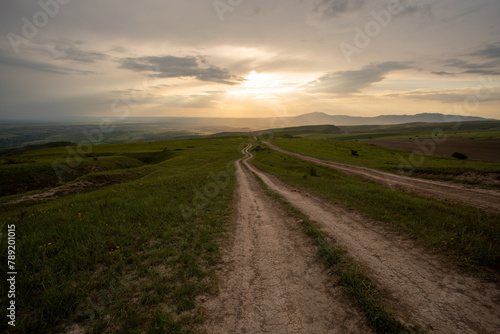 VIew of a road on the mountains during sunset