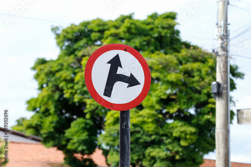 white traffic sign indicating two directions